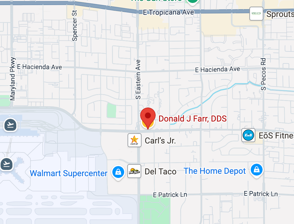 Map with a red pin marking 'Donald J Farr, DDS' near Carl's Jr. in a suburban shopping area (near Walmart, Del Taco).